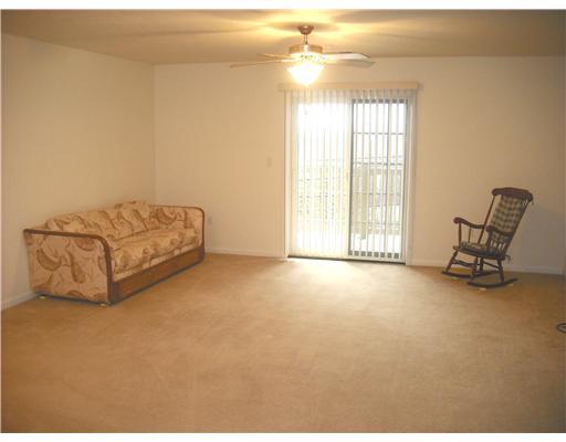 1 Coraopolis Road, Unit 201 Coraopolis, PA 15108 - Photo 2 of 18 Living Room. Spacious living room has walkout to second-floor balcony overlooking Pine Hollow Road.