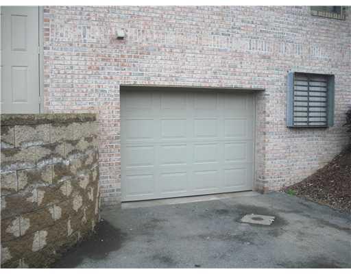 1 Coraopolis Road, Unit 201 Coraopolis, PA 15108 - Photo 16 of 18 Parking Lot/Garage. Entrance to garage; opposite side of building from No. 201.