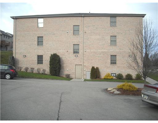 1 Coraopolis Road, Unit 201 Coraopolis, PA 15108 - Photo 17 of 18 Exterior Front. Side view of the building from the parking lot, facing Unit 201.