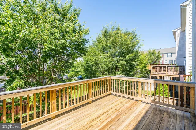 a view of a two chairs in the balcony