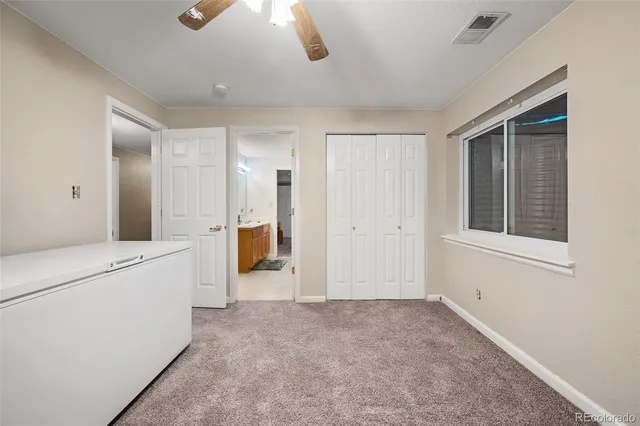 a view of a workspace with furniture