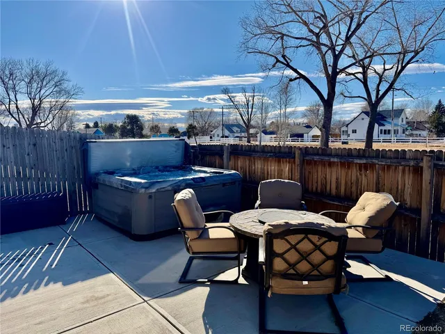 a garden with trees in front of it