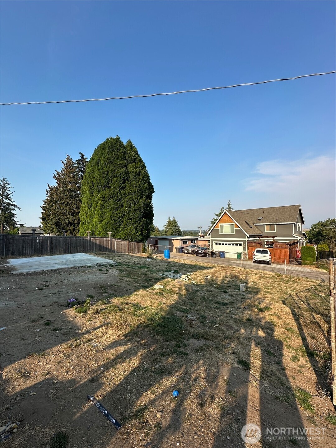 16056 9th Avenue Southwest, Unit B Burien, WA 98166 - Photo 13 of 20 a view of a town with big trees and a big yard