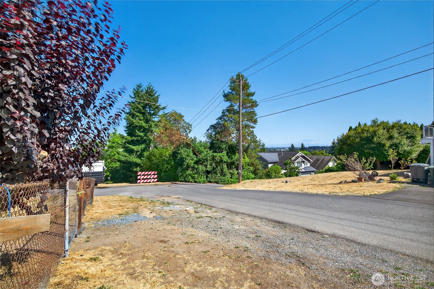 16056 9th Avenue Southwest, Unit B Burien, WA 98166 - Photo 19 of 20 a view of a road with a yard