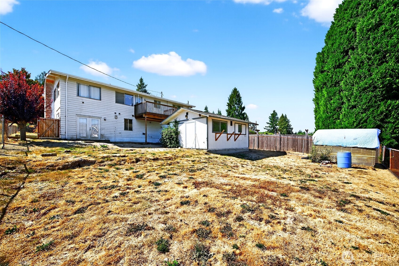 16056 9th Avenue Southwest, Unit B Burien, WA 98166 - Photo 8 of 20 a view of a house with a snow