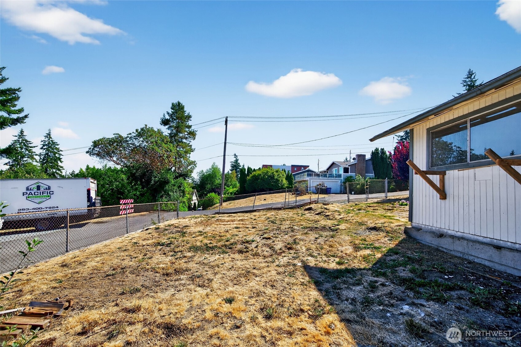 16056 9th Avenue Southwest, Unit B Burien, WA 98166 - Photo 9 of 20 a view of a backyard