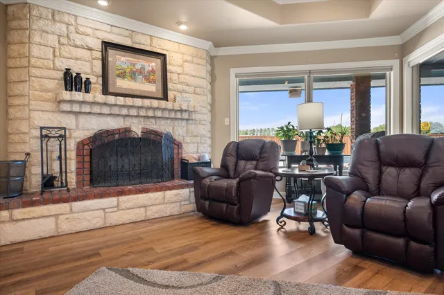 a view of dining room and hall with wooden floor