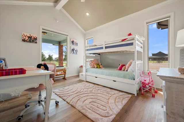 a bathroom with a sink vanity granite tub and a mirror