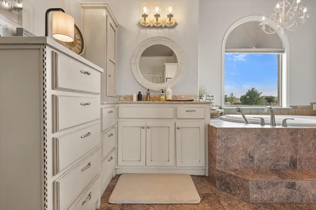 a view of a room that has a bed and a window