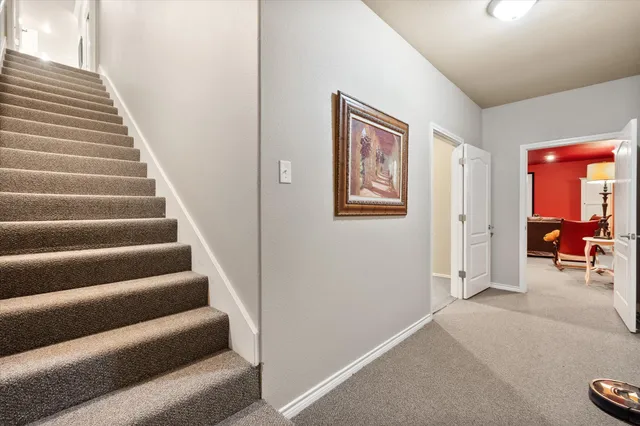 a view of parking garage with cars