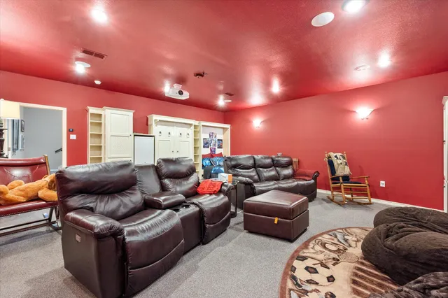 a bathroom with a toilet and a shower curtain