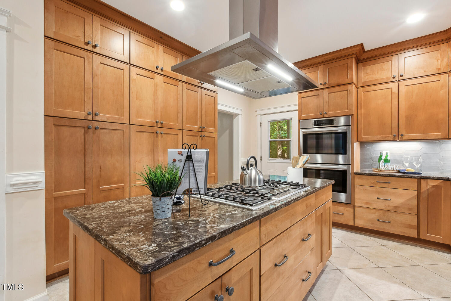 2012 Mt Vernon Church Road Raleigh, NC 27614 - Photo 14 of 71 a kitchen with stainless steel appliances granite countertop a sink a stove cabinets and wooden floor