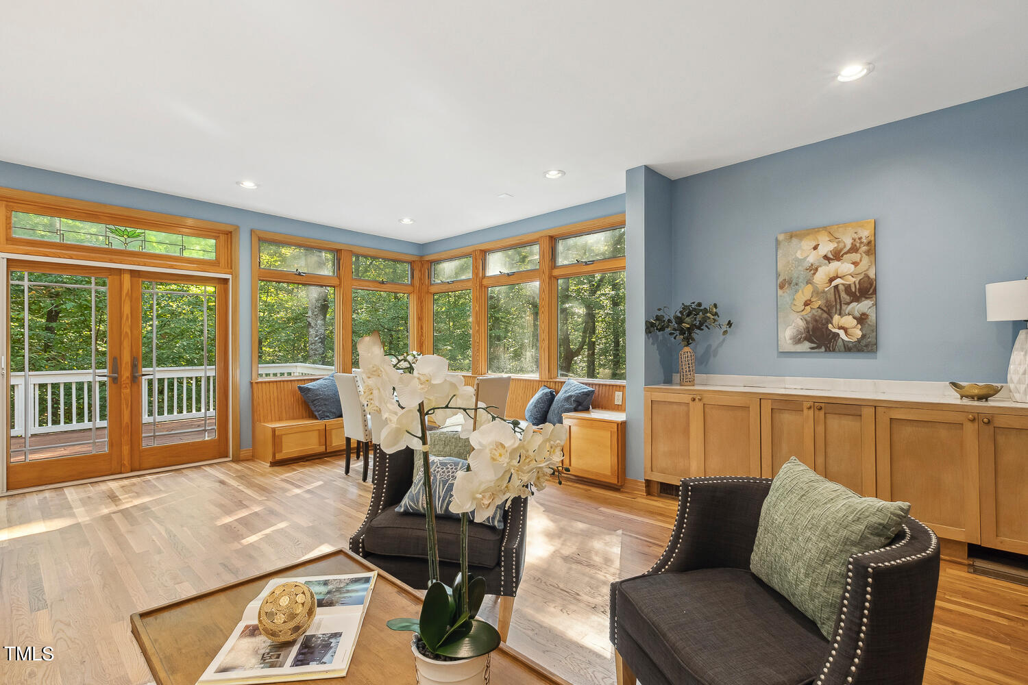 2012 Mt Vernon Church Road Raleigh, NC 27614 - Photo 22 of 71 a living room with furniture large windows and wooden floor