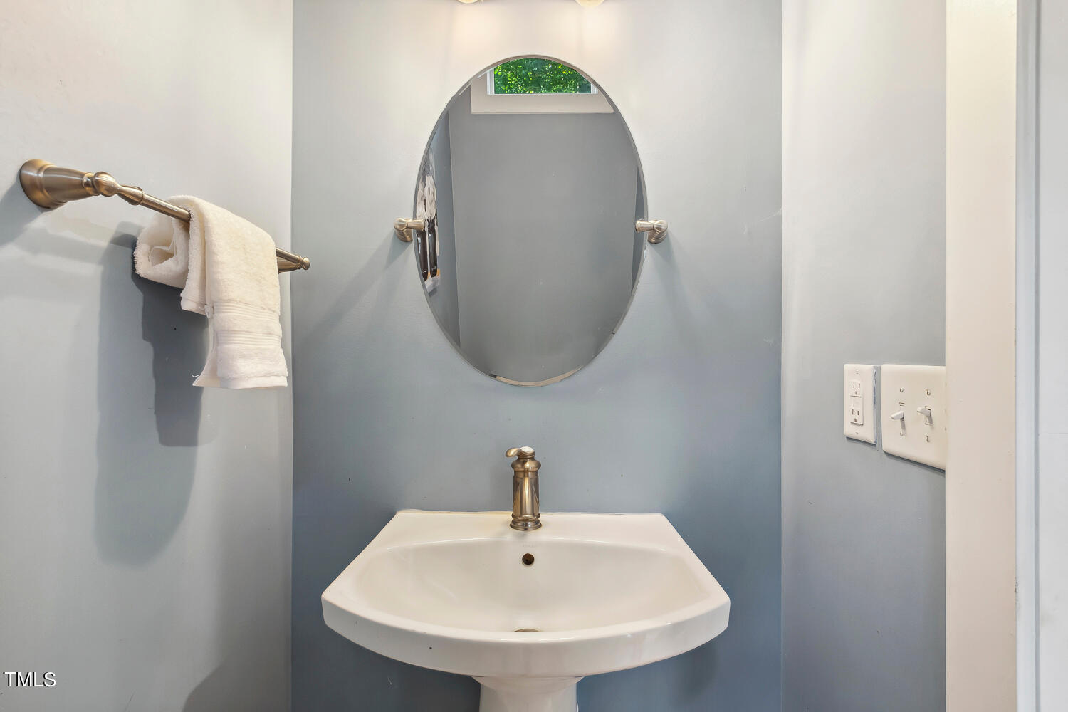 2012 Mt Vernon Church Road Raleigh, NC 27614 - Photo 26 of 71 a bathroom with a sink and mirror