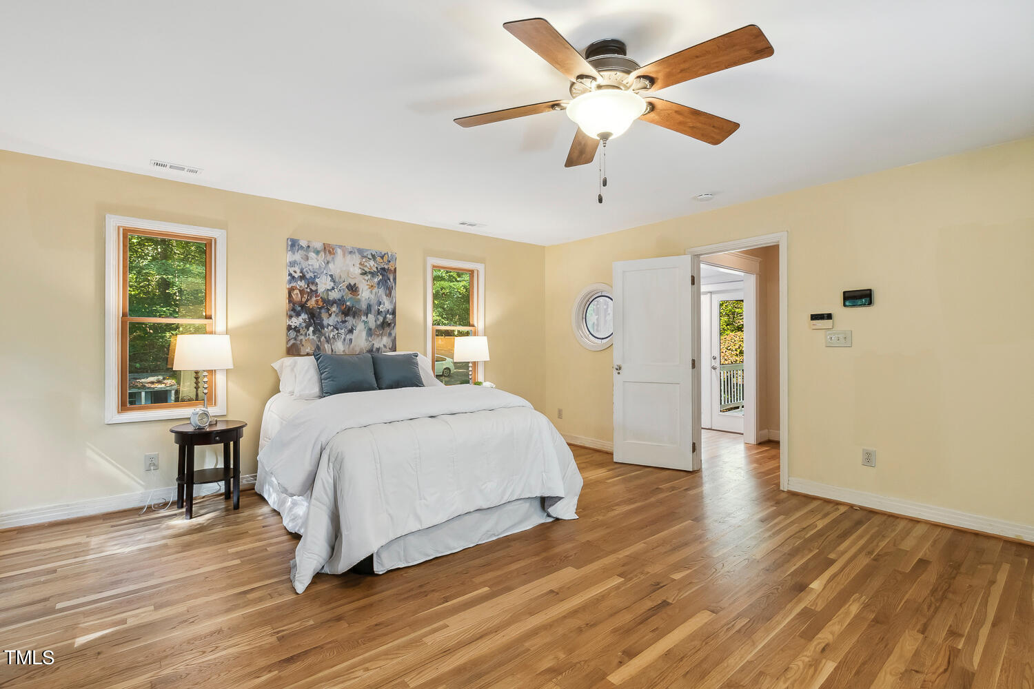 2012 Mt Vernon Church Road Raleigh, NC 27614 - Photo 28 of 71 a spacious bedroom with a bed and wooden floor