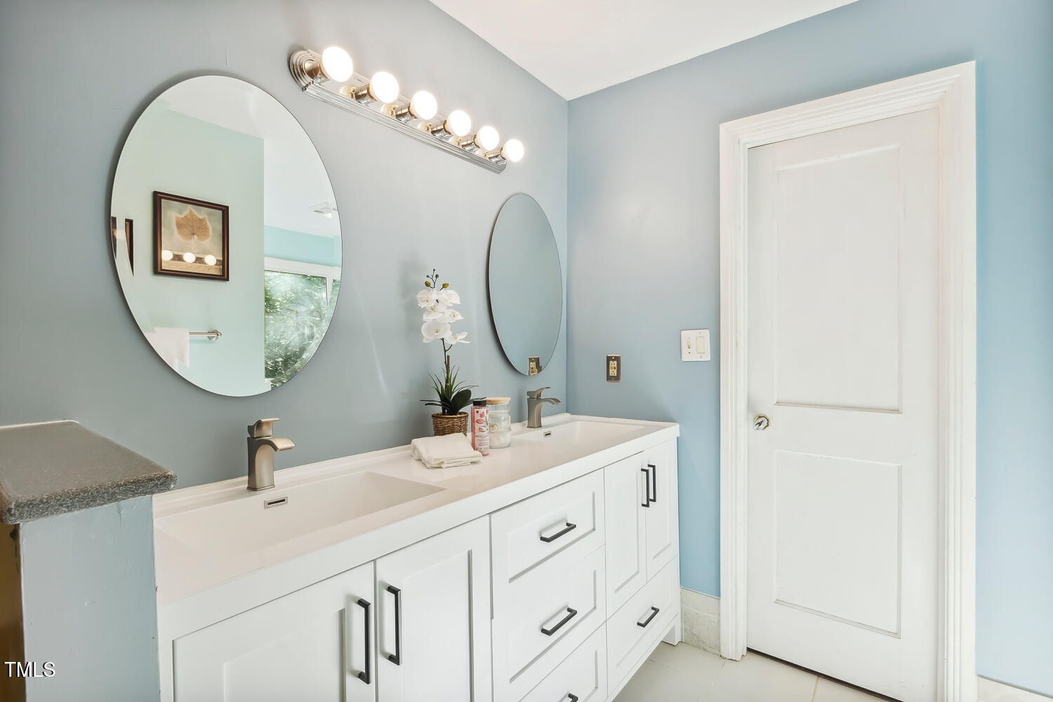 2012 Mt Vernon Church Road Raleigh, NC 27614 - Photo 31 of 71 a bathroom with a double vanity sink and a mirror