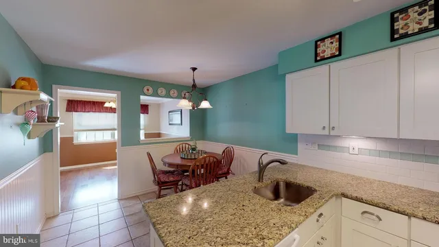 a view of a living room and a flat screen tv