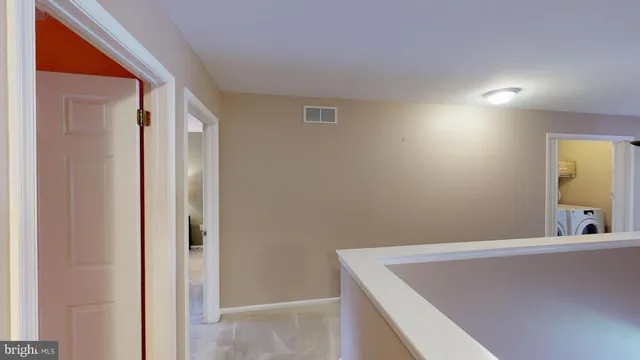 a bathroom with a sink a mirror and vanity