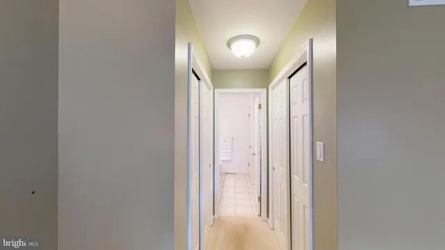 a bathroom with a sink a toilet a tub and mirror