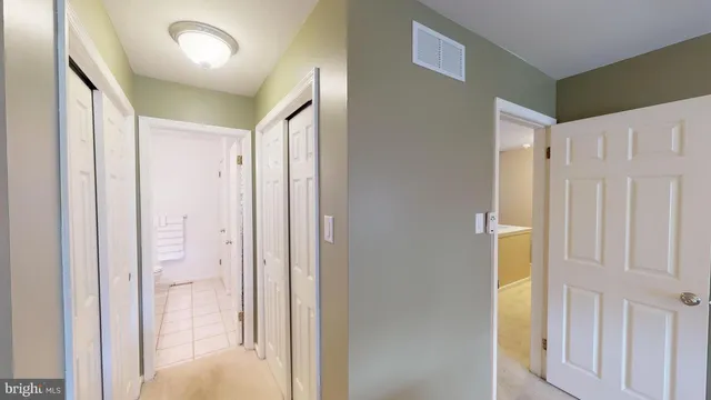 a bathroom with a tub and shower