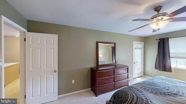 a view of storage and utility room with washer and dryer