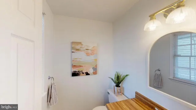 a kitchen with a sink a stove and refrigerator