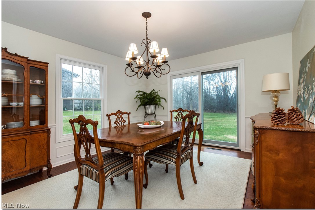 30049 Bryce Road Cleveland, OH 44124 - Photo 5 of 27 The dining room adjoins the living room and offers patio access and windows galore.
