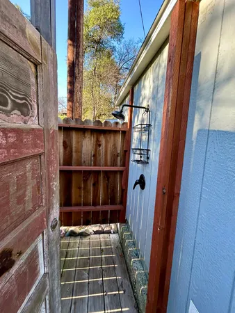 a view of a house with a yard and garage