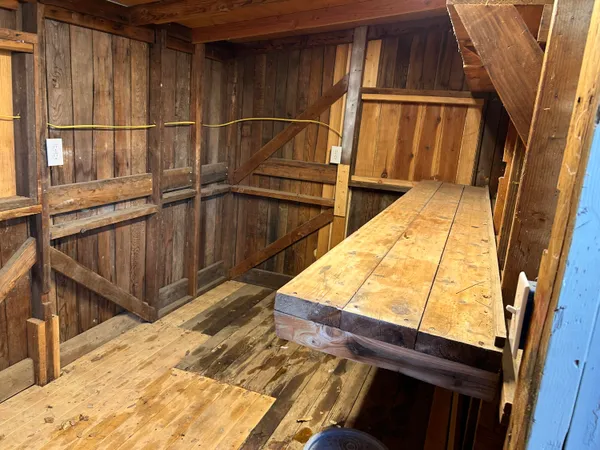 a view of deck with wooden floor and outdoor seating