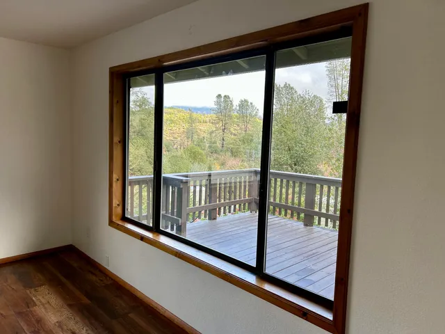 a view of a livingroom with wooden floor