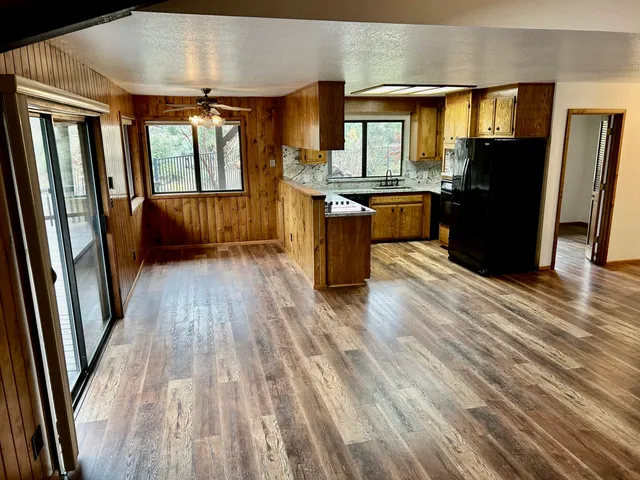 a bathroom with a sink a toilet and bathtub