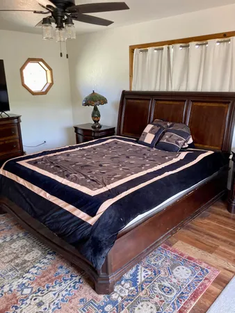 a view of front door and wooden floor