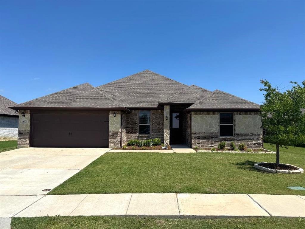 a front view of house with yard