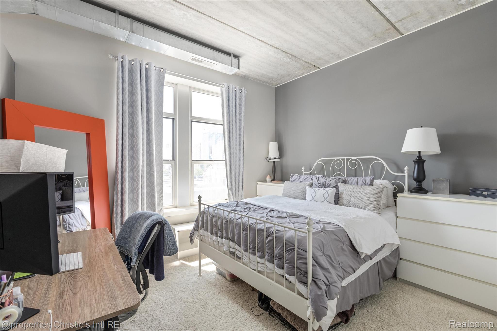 66 Winder Street, Unit 332 Detroit, MI 48201 - Photo 20 of 30 Bedroom featuring light colored carpet and an office area
