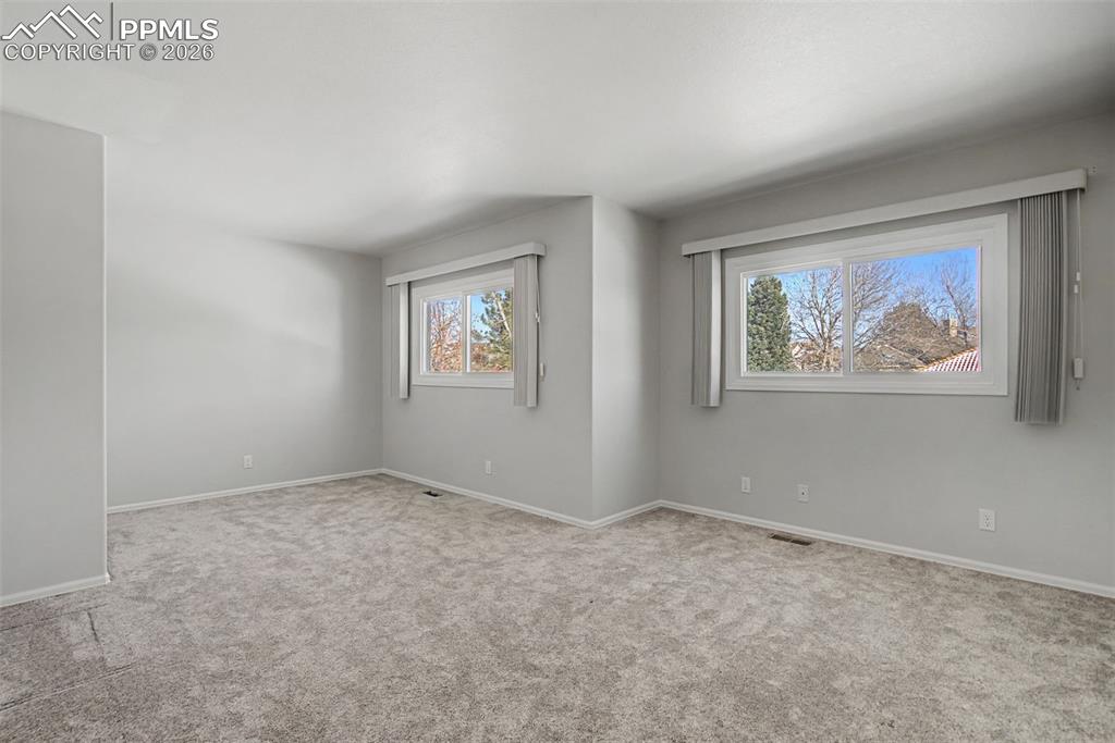 20 Luxury Lane Colorado Springs, CO 80921 - Photo 16 of 36 a view of an empty room with a window