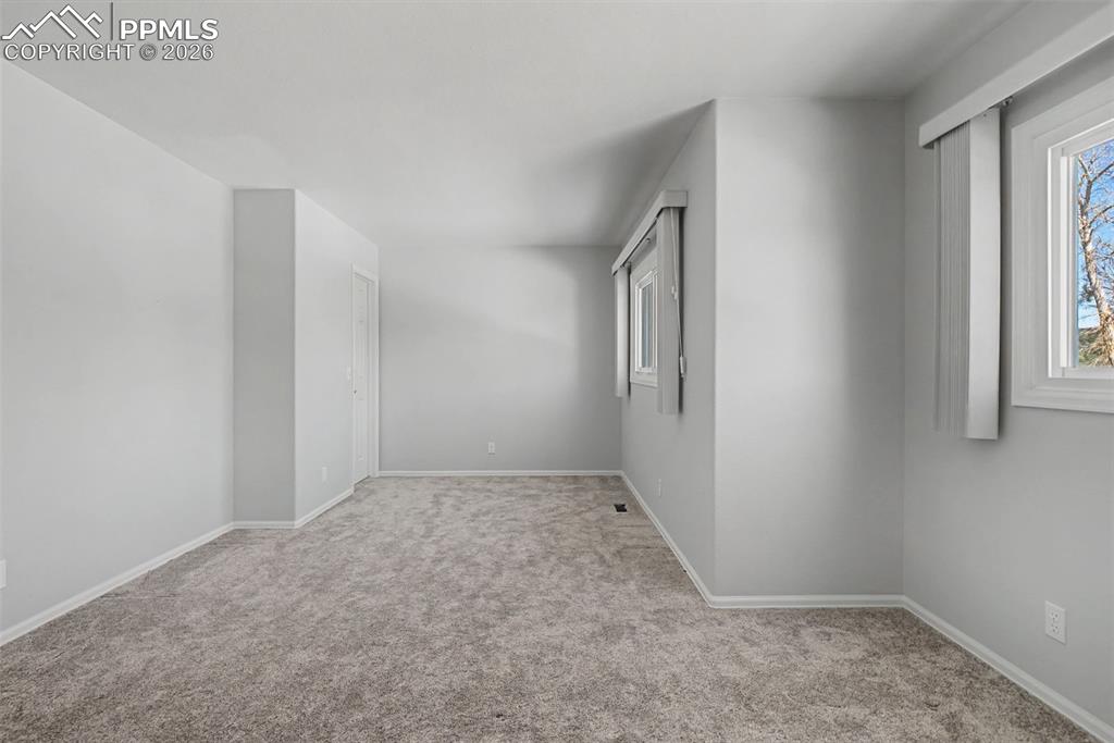20 Luxury Lane Colorado Springs, CO 80921 - Photo 17 of 36 an empty room with windows