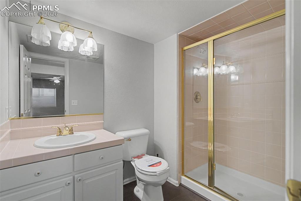 20 Luxury Lane Colorado Springs, CO 80921 - Photo 25 of 36 a bathroom with a sink toilet and shower