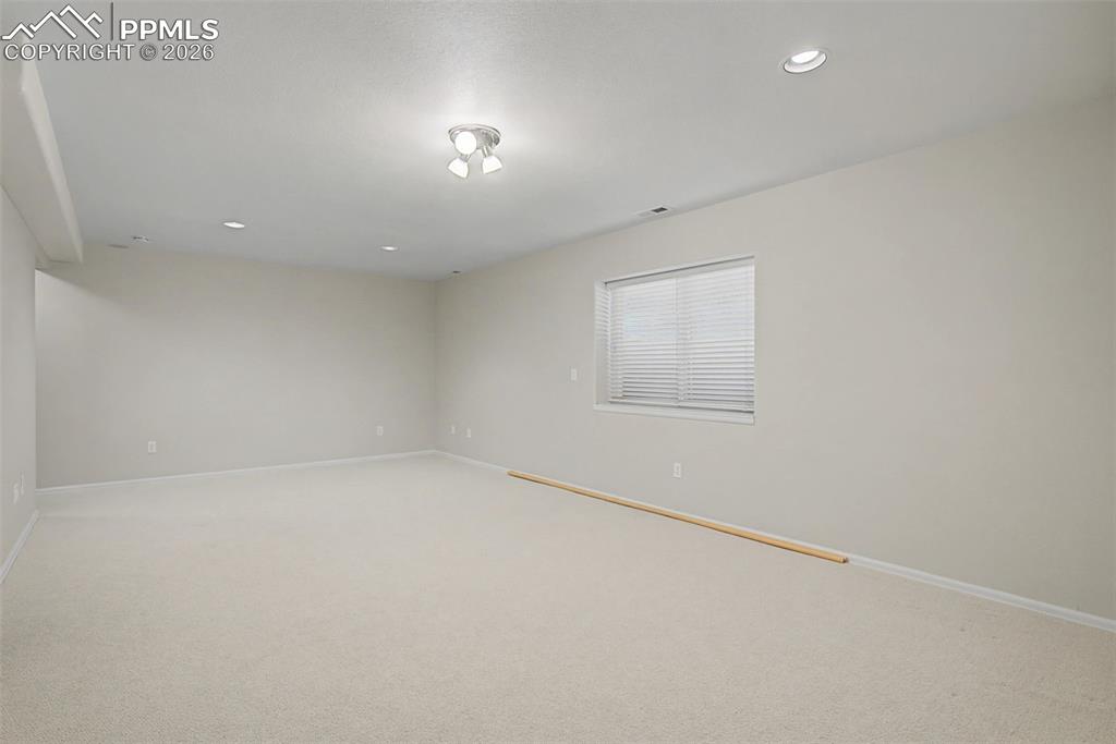 20 Luxury Lane Colorado Springs, CO 80921 - Photo 27 of 36 an empty room with a workbench