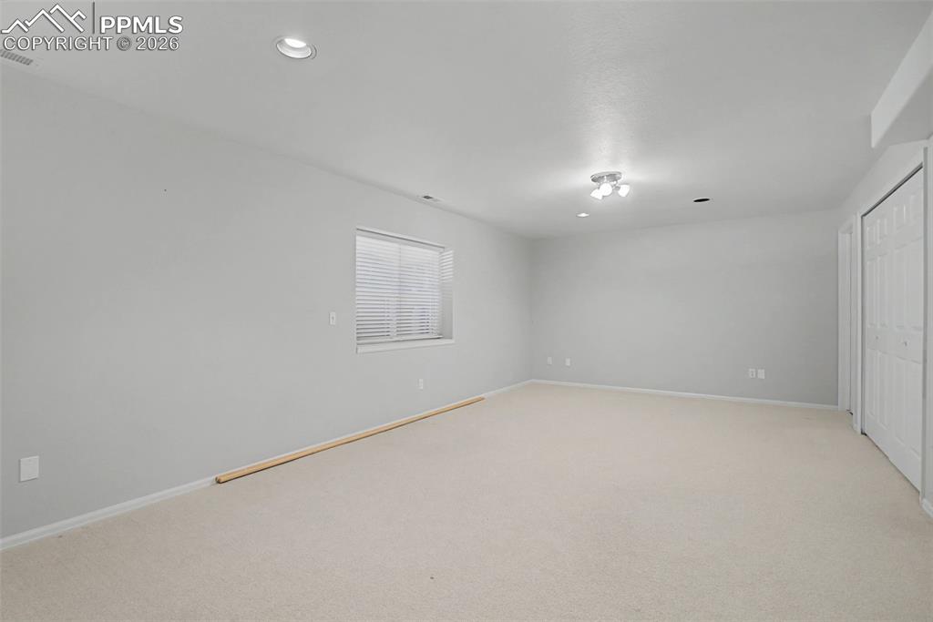20 Luxury Lane Colorado Springs, CO 80921 - Photo 28 of 36 an empty room with a empty space and windows