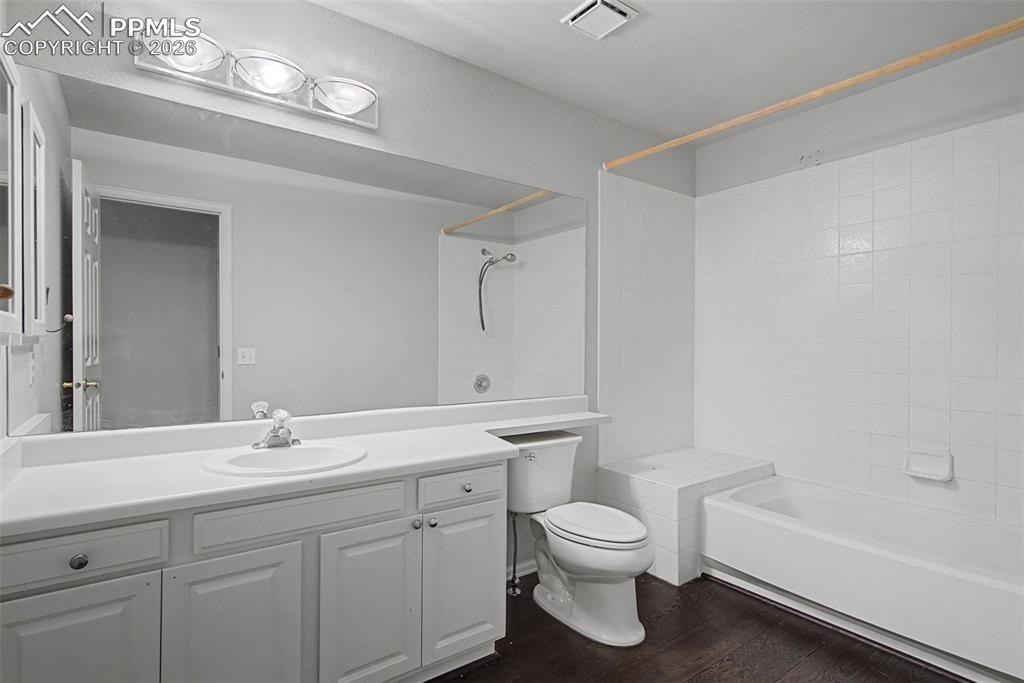 20 Luxury Lane Colorado Springs, CO 80921 - Photo 30 of 36 a bathroom with a sink a toilet and a bathtub