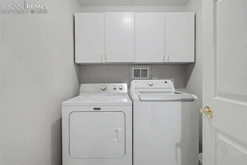 20 Luxury Lane Colorado Springs, CO 80921 - Photo 31 of 36 a utility room with dryer and washer
