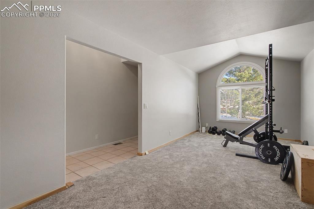 20 Luxury Lane Colorado Springs, CO 80921 - Photo 4 of 36 wooden floor and window in a room