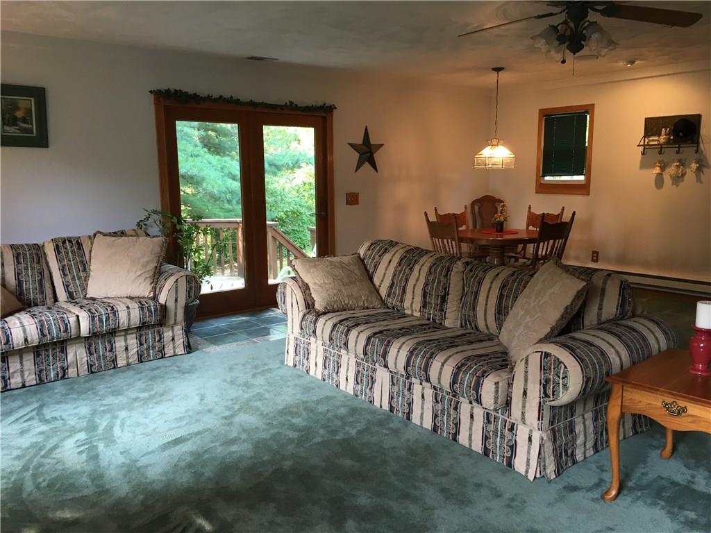 532 Steiner Bridge Road Valencia, PA 16059 - Photo 21 of 25 Family room in the addition with French doors to deck.