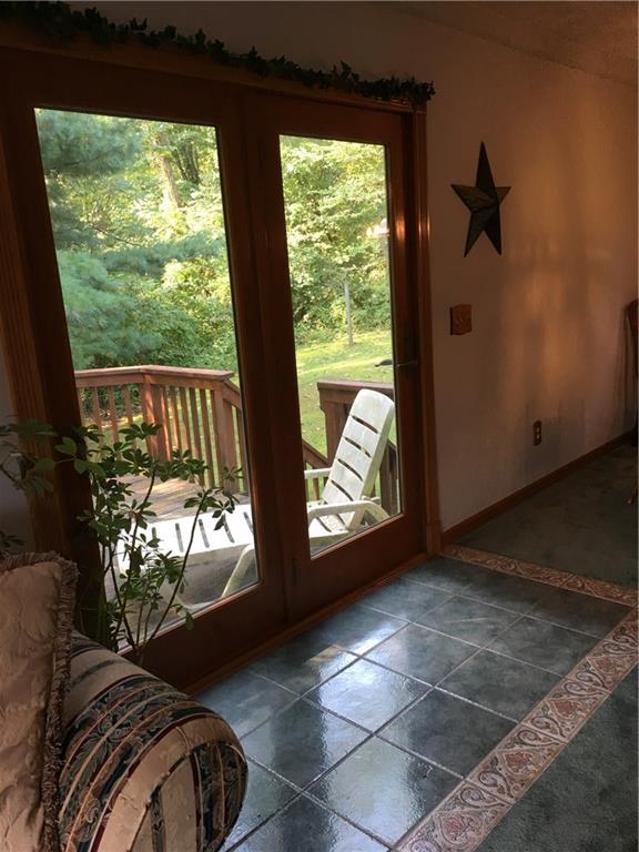 532 Steiner Bridge Road Valencia, PA 16059 - Photo 25 of 25 Looking out to side deck from addition.