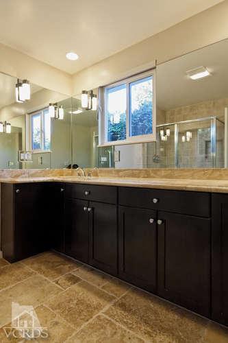 187 Kanan Road Oak Park, CA 91377 - Photo 14 of 20 a kitchen with a sink and a window