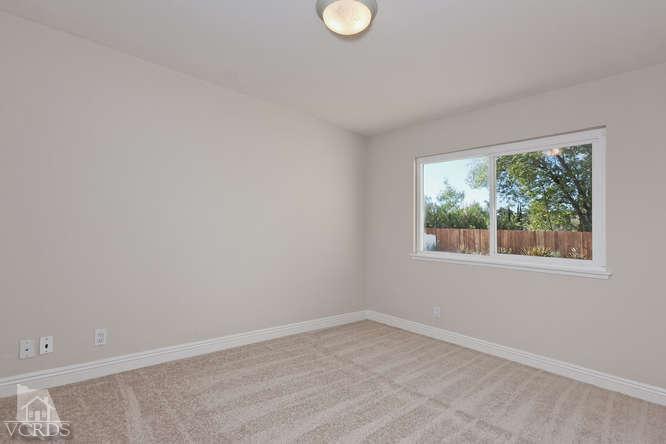 187 Kanan Road Oak Park, CA 91377 - Photo 19 of 20 an empty room with a window