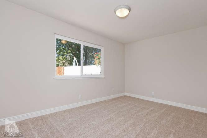 187 Kanan Road Oak Park, CA 91377 - Photo 20 of 20 an empty room with a window