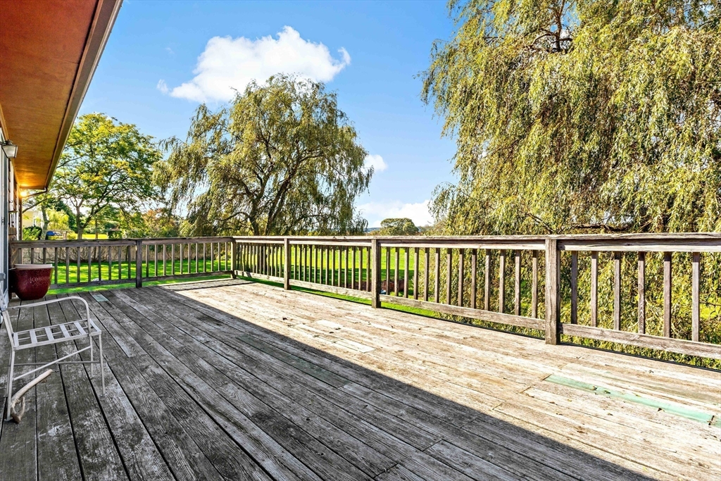 3211 Main Road Tiverton, RI 02878 - Photo 11 of 34 a view of deck and wooden floor