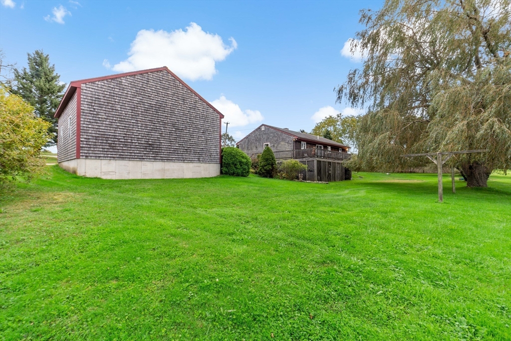 3211 Main Road Tiverton, RI 02878 - Photo 13 of 34 a view of a house with a yard