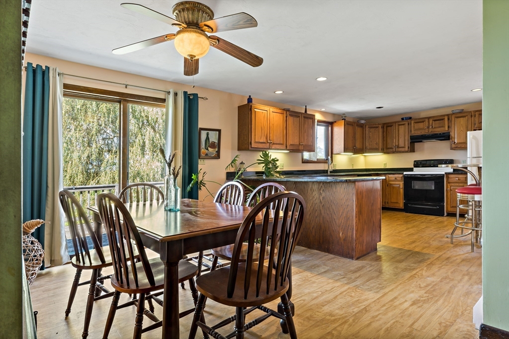 3211 Main Road Tiverton, RI 02878 - Photo 20 of 34 a view of a dining room with furniture window and outside view